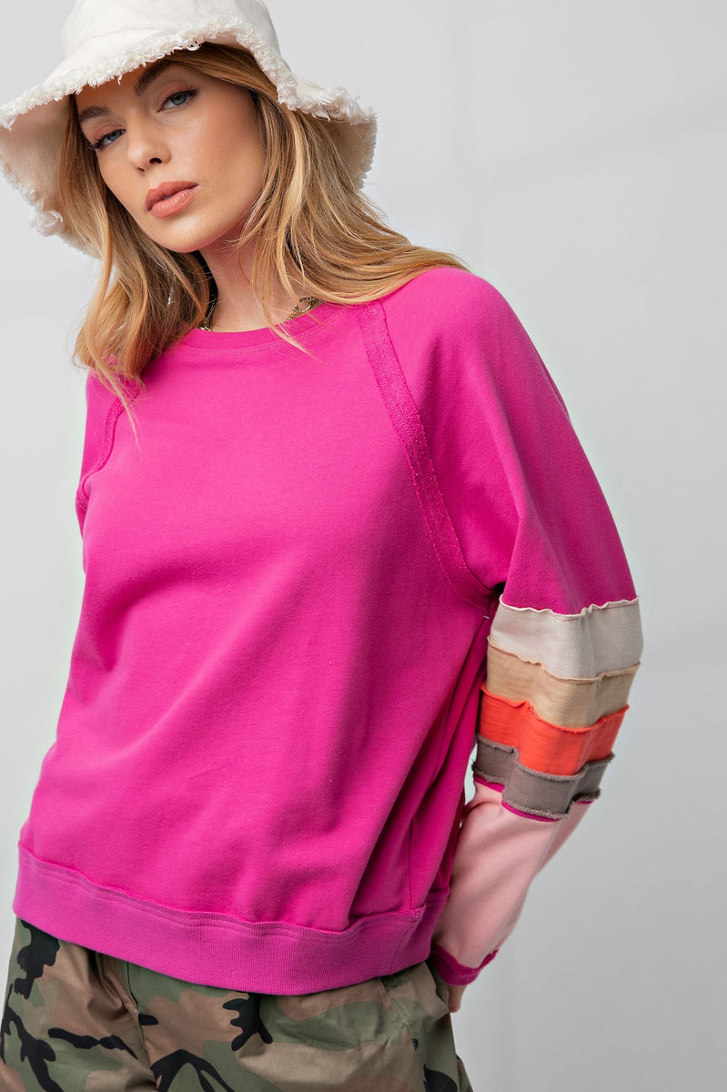 Easel Loose Fit Terry Knit Top with Colorblock Sleeves in Fuchsia
