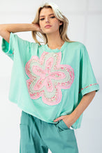 Load image into Gallery viewer, Easel Mineral Washed Cotton Top with Flower Patch in Atlantic Green
