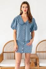 Load image into Gallery viewer, TRENDiLiTY Washed Denim Textured Bow Pattern Top in Denim