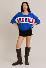 Load image into Gallery viewer, Le Lis OVERSIZED Semi CROPPED Top with Chenille and Rhinestone AMERICA Patches in Blue-White