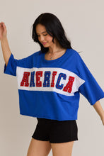 Load image into Gallery viewer, Le Lis OVERSIZED Semi CROPPED Top with Chenille and Rhinestone AMERICA Patches in Blue-White