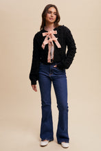Load image into Gallery viewer, Listicle Open Front Cable Knit Cardigan with Contrasting Color Bow Tie Front in Black