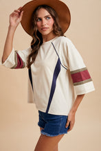 Load image into Gallery viewer, AnnieWear French Terry Colorblock Varsity Top in Cream Combo