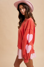 Load image into Gallery viewer, AnnieWear Heart Patched Mineral Washed Sweatshirt in Red/Pink