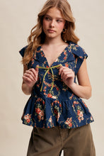 Load image into Gallery viewer, Listicle Floral Peplum Tie-Front Top in Navy
