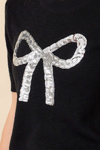 Load image into Gallery viewer, Main Strip Sweater Knit Top with Sequin Bow Front in Black