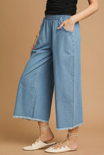 Load image into Gallery viewer, Umgee Fringe Hem Denim Pants in Light Denim