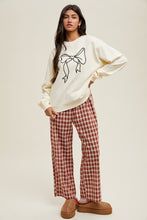 Load image into Gallery viewer, Wishlist French Terry Knit Top with Bow Print Front in Cream/Black