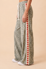 Load image into Gallery viewer, Heimish Leopard Print Heart Stripe Wide-Leg Pants in Cream ON ORDER