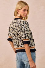 Load image into Gallery viewer, BiBi Textured Rose Knit Top With Contrasting Banded Puff Sleeves in Black/Light Grey