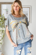 Load image into Gallery viewer, Oli & Hali Paint Splatter Top with Large Ribbon Bow Patch on Front in Blue