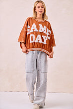 Load image into Gallery viewer, BiBi OVERSIZED French Terry Top with GAME DAY Letter Patchwork Front in Burnt Orange/White