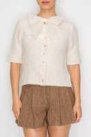 STITCH & Co. Short Sleeve Bow Tie Cardigan in Cream
