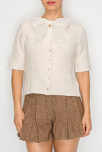 Load image into Gallery viewer, STITCH &amp; Co. Short Sleeve Bow Tie Cardigan in Cream
