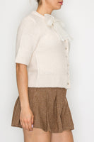 STITCH & Co. Short Sleeve Bow Tie Cardigan in Cream