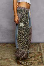 Load image into Gallery viewer, POL Mixed Patchwork Joggers with Crochet Flower Patches in Denim Leo Multi ON ORDER
