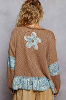 POL OVERSIZED Ribbed Knit Top with Contrasting Flower Patches in Rustic Brick