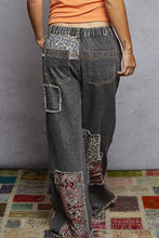 Load image into Gallery viewer, POL Denim Mixed Print Patchwork and Stud Detailed Pants in Black
