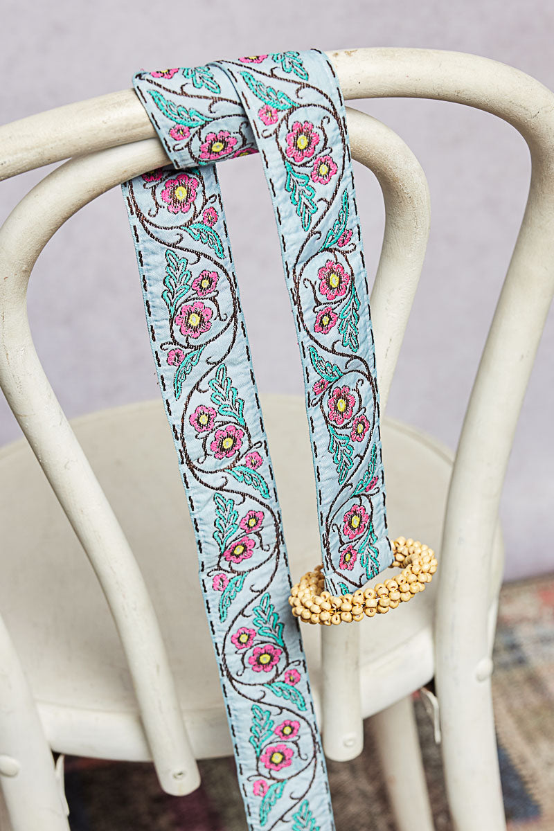 POL Multi Color Floral Embroidered Belt with Ticking Trim in Sky Blue