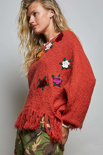 POL Poncho Sweater with Flower and Fringe Details in Brick