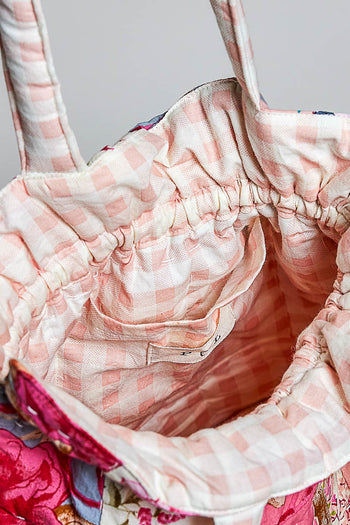 POL Floral Quilted Drawstring Shoulder Bag in Pink Multi