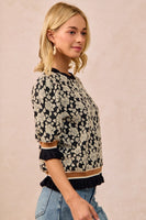 BiBi Textured Rose Knit Top With Contrasting Banded Puff Sleeves in Black/Light Grey
