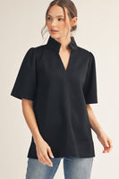 Jodifl Standing Neckline Notched V Neck Solid Color Top in Black