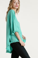Umgee Linen Blend Long Bell Sleeve Round Neck Top with Chest Pocket and Frayed High Low Scoop Hem in Emerald