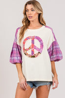 Sage+Fig Solid Color Top with Peace Sign Applique and Plaid Sleeves in Purple