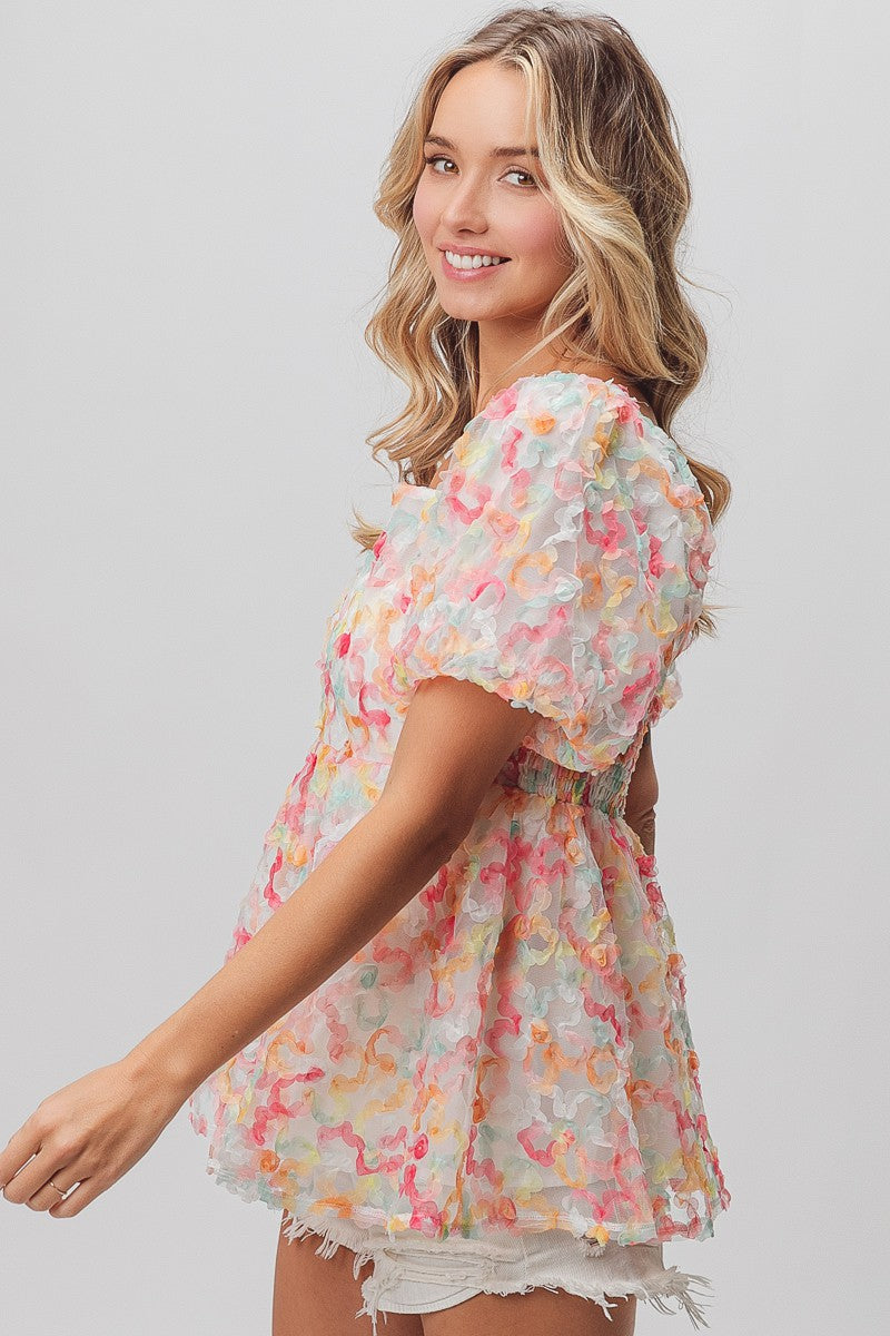 BiBi Multi Colored Flower Peplum Top in Coral/Apricot – June Adel