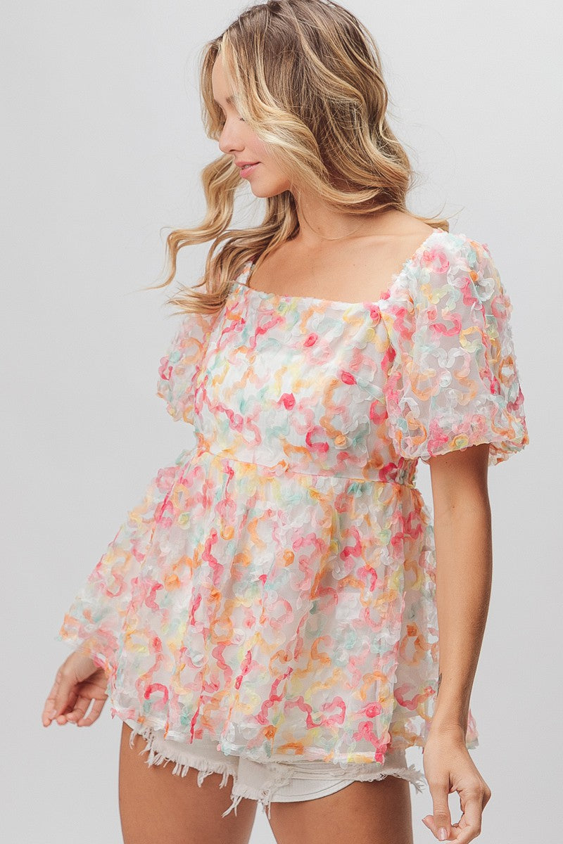 BiBi Multi Colored Flower Peplum Top in Coral/Apricot – June Adel