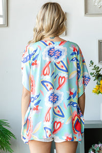 First Love Floral Print Poncho Top in Blue Multi