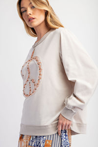 Easel Top with Raised Peace Sign Patch Embroidery and Stud Details in Ecru