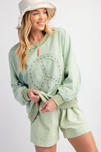 Load image into Gallery viewer, Easel Top with Raised Peace Sign Patch Embroidery and Stud Details in Olive Grey
