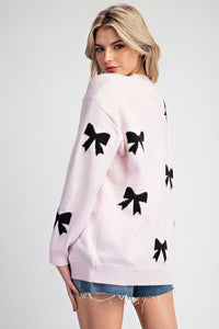 ee:some Solid Color Knit Sweater with Bow Print in Baby Pink