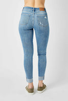 Judy Mid Rise Destroyed and Cuffed Skinny Denim Jeans in Medium Wash