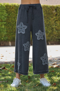 Oddi Solid Color Flower Patched Palazzo Pants in Washed Black