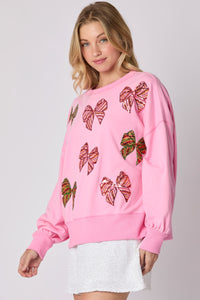 Peach Love Christmas Multi Colored Sequin Bow Sweatshirt in Candy Pink