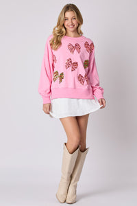 Peach Love Christmas Multi Colored Sequin Bow Sweatshirt in Candy Pink