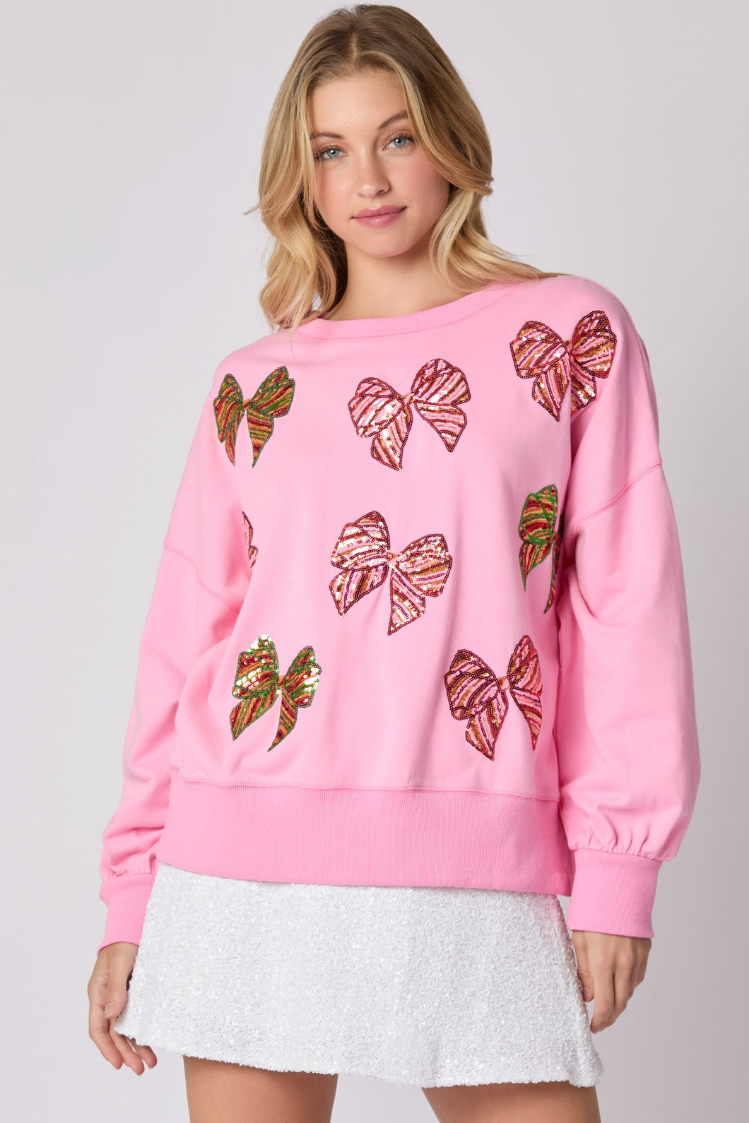 Peach Love Christmas Multi Colored Sequin Bow Sweatshirt in Candy Pink