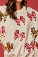 Load image into Gallery viewer, Peach Love Christmas Multi Colored Sequin Bow Sweatshirt in Cream
