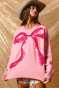 BiBi Solid Color Knit Sweater with Large Sequin Bow Front in Pink/Fuchsia