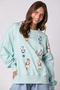 Peach Love Christmas Sequin Nutcracker Sweatshirt in Baby Blue