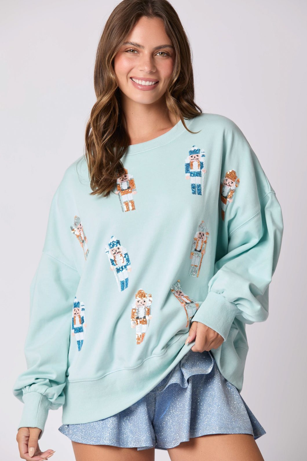 Peach Love Christmas Sequin Nutcracker Sweatshirt in Baby Blue