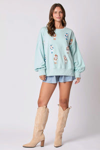 Peach Love Christmas Sequin Nutcracker Sweatshirt in Baby Blue