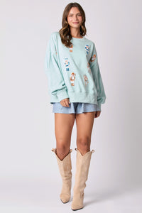 Peach Love Christmas Sequin Nutcracker Sweatshirt in Baby Blue