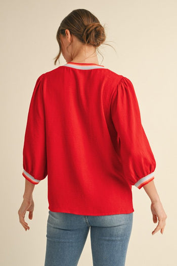 Jodifl Lightweight Solid Color Top with Contrasting Stripe Details in Tomato Red