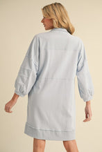 Load image into Gallery viewer, Jodifl Terry Knit Dress with Open Neckline with Bow Tie Closure in Sky Blue
