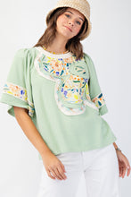 Load image into Gallery viewer, Easel Soft Washed Terry Knit top with Large Flower Patch in Pistachio
