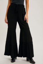 Load image into Gallery viewer, Bluivy Solid Color Tiered Palazzo Pants in Black
